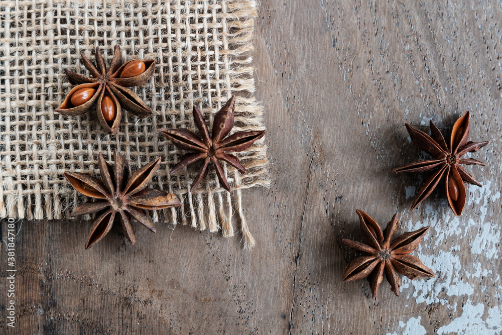 Anise stars on rustic background Anise stars on rustic background