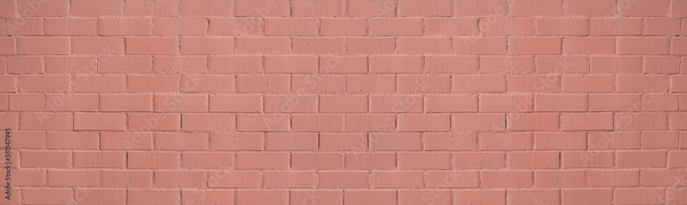 Obraz premium Wall of bricks painted in salmon color
