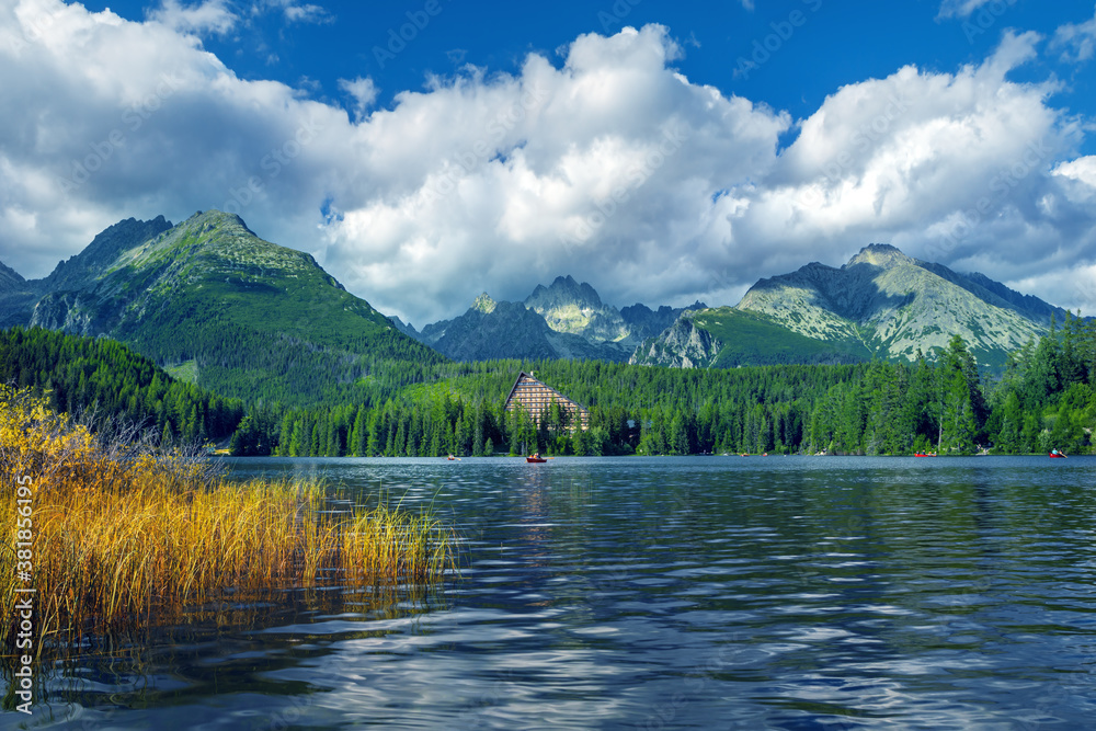 Panorama of High Tatras mountains - National park and Strbske pleso  (Strbske lake) mountain lake in Slovakia