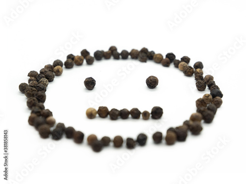 Black pepper emoticon sad. Isolated tasty, background herb, spice, peppercorn emoticons for social media banner.