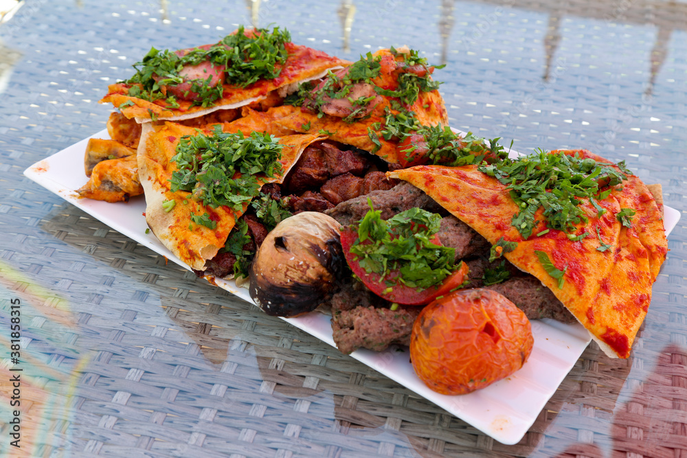 Arabic Meat Kabab and Chicken grill on plate outdoor Mashawi Kabab