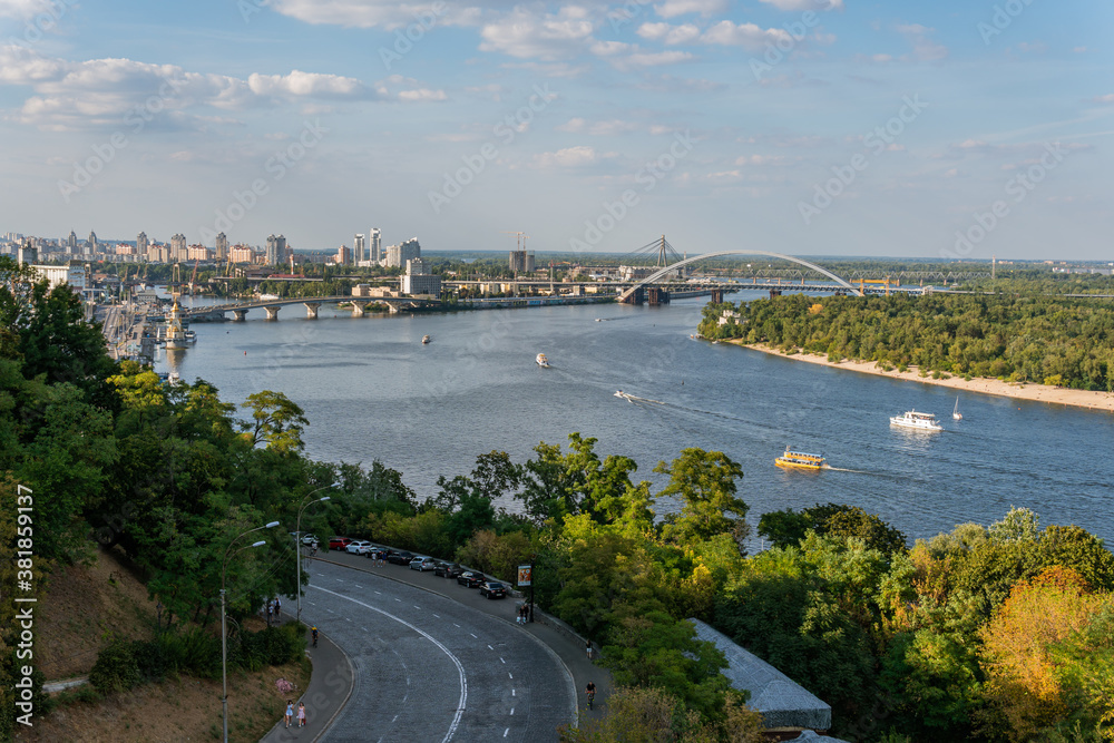 Kyiv (Kiev) / Ukraine - August 23, 2020: Amazing view on the Dnipro river in the center, near the famous and ancient tourist and business region with many remarkable sights