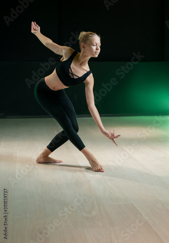 young girls dancing in the Studio on a dark background