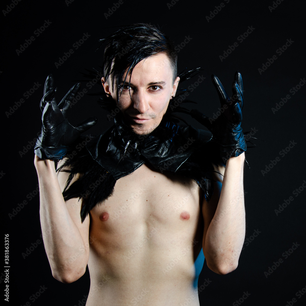Halloween and art. An attractive guy. Black background. Halloween and art. An attractive guy. Black background.