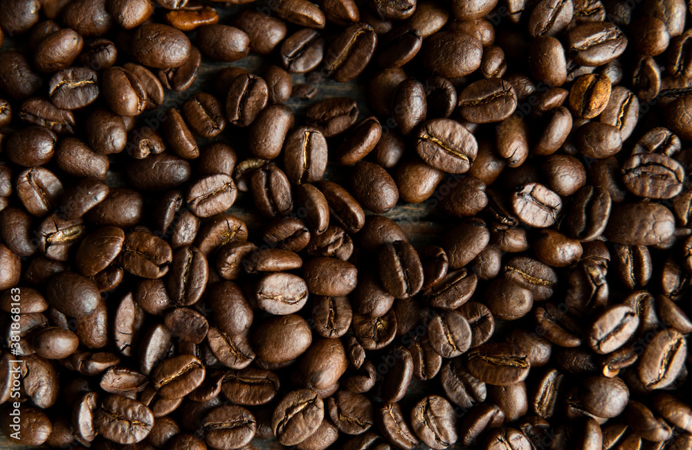 Fresh arabica coffee beans as a texture or background. Fresh arabica coffee beans as a texture or background.
