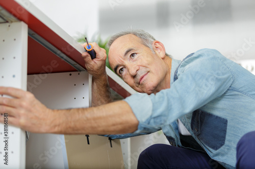 man repair and fixing leaky faucet