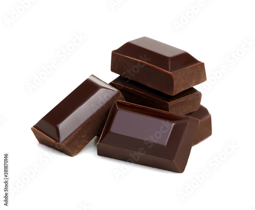 close up of chocolate pieces on white