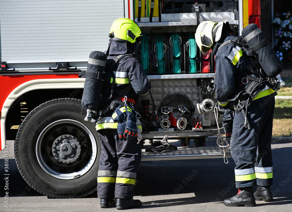 Firefighter at the scene of a fire Firefighter at the scene of a fire