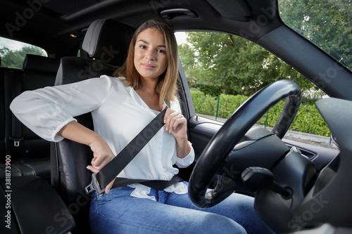 young woman driving her car