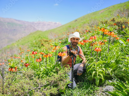 red tulips, flipping, and a young male climber
 photo