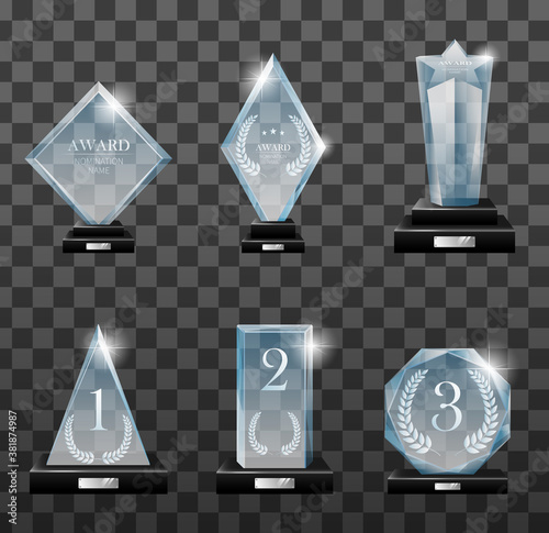 Glass trophy awards set. Vector isolated image fogged crystal award designs shape on board pedestal for awarded champion