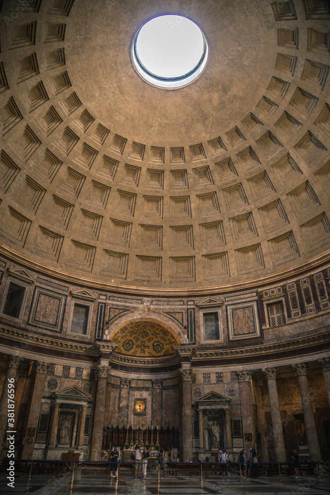 The dome of the Pantheon ancient roman temple then christian church. One of the most important monument in Rome Italy Panoramic view of the ceiling with the characteristic hole that gives light inside