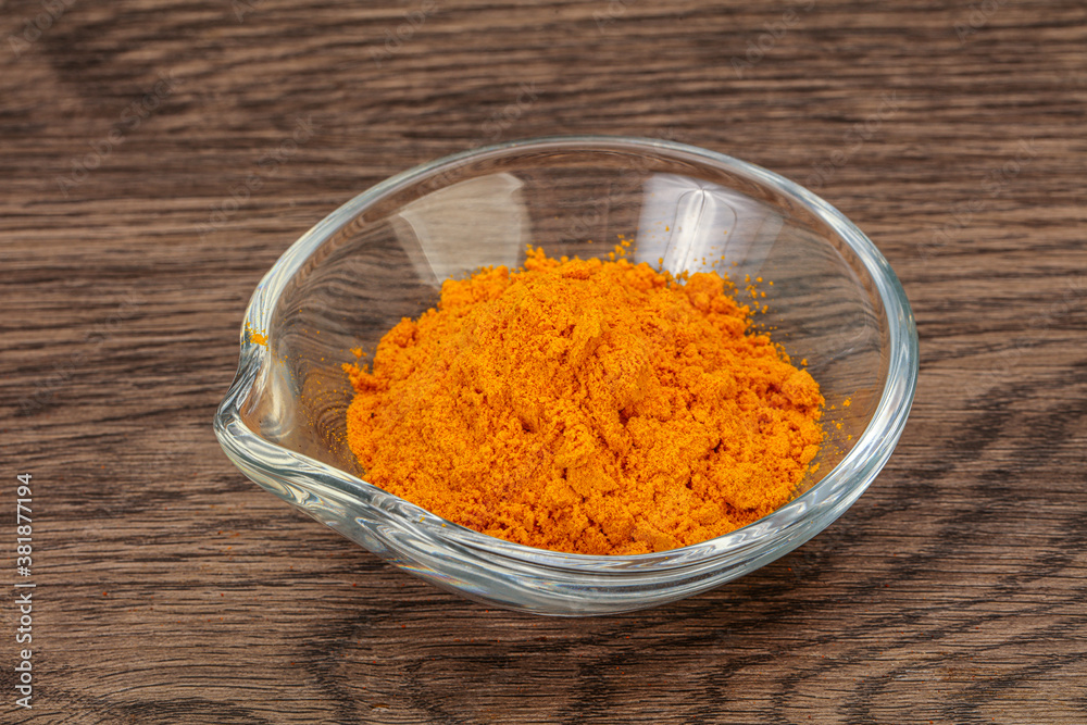 Tumeric powder in the bowl