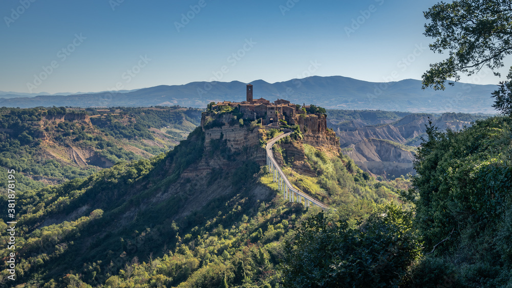 Panoramic view of the little medieval village of Civita di Bagnoregio. Beautiful place near Viterbo Italy. The dying city. Ancient houses in the nature, amazing panorama of a natural landscape