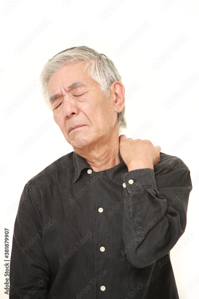 senior Japanese man suffers from neck ache senior Japanese man suffers from neck ache