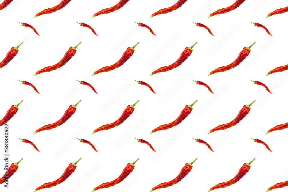 Seamless pattern of dried red chili peppers or cayenne chili peppers isolated on white background. Seamless pattern of dried red chili peppers or cayenne chili peppers isolated on white background.