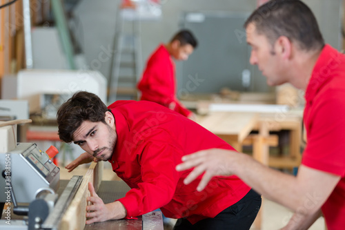 guiding a carpentry apprentice