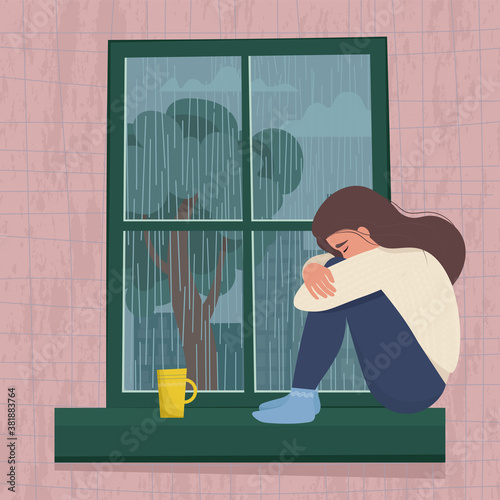 Depressed woman sitting by the window. 
Seasonal depression concept. Cute vector illustration in cartoon flat style