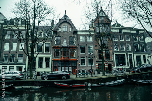 View on Amsterdam traditional buildings from the canal