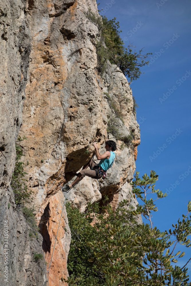 people practicing mountain climbing outdoors