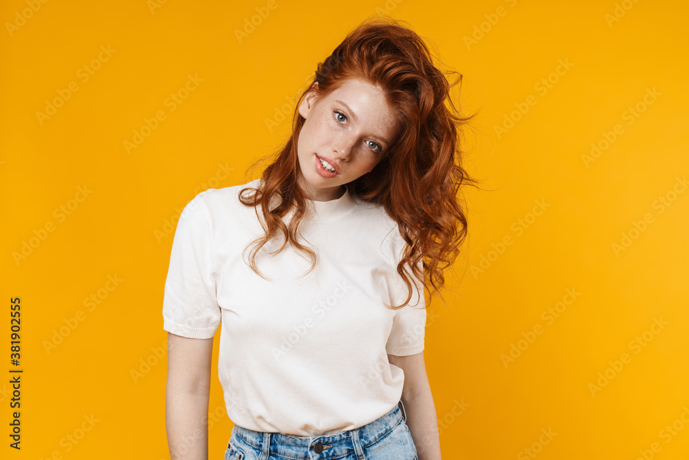 Image of ginger beautiful girl posing and looking at camera
