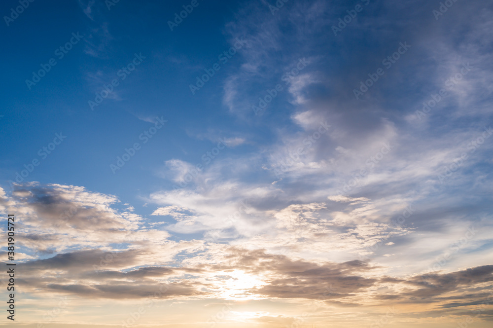 blue sky with clouds and sunset background