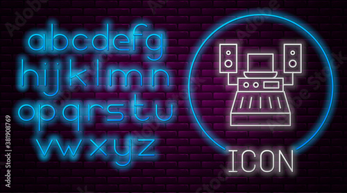 Glowing neon line Music sound recording studio control room with professional equipment icon isolated on brick wall background. Neon light alphabet. Vector.