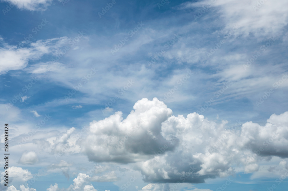 White fluffy clouds with blue sky