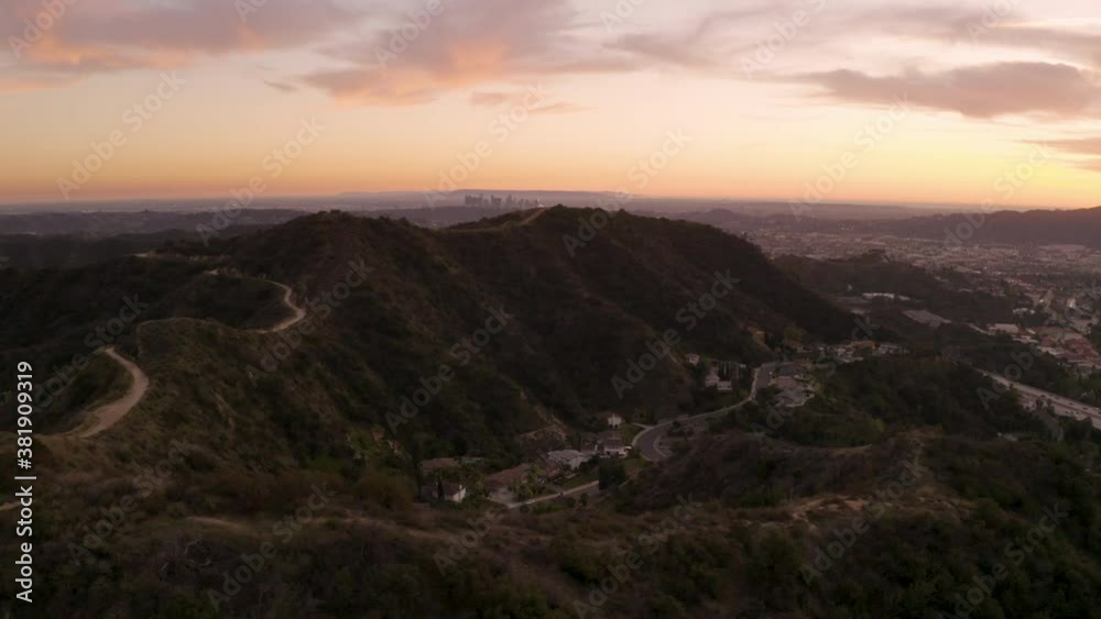 Cinematic aerial flyover of sunset sky in Glendale, California Cinematic aerial flyover of sunset sky in Glendale, California