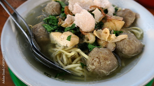 Meatballs with Noodle Soup on table at street food market