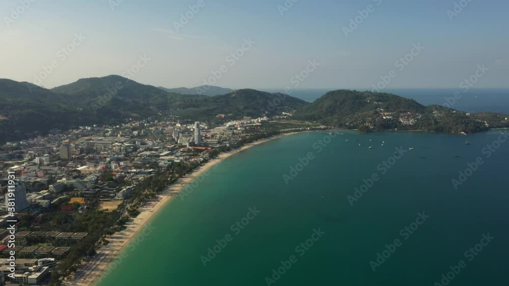 Top view of clear azure blue transparent sea with white sand. Hot sunny weather. Aerial view of the city. drone flight over the jungle and sea. overlooks the city Top view of clear azure blue transparent sea with white sand. Hot sunny weather. Aerial view of the city. drone flight over the jungle and sea. overlooks the city