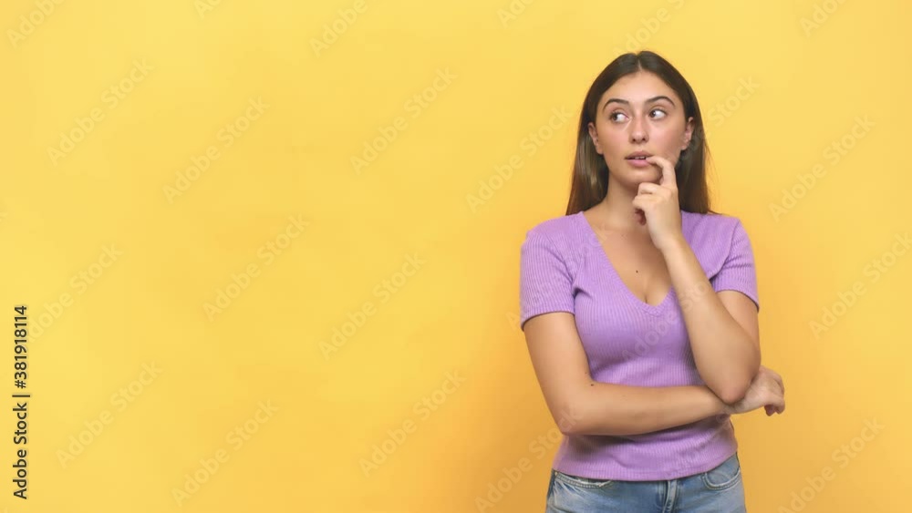 Young caucasian woman relaxed thinking about something looking at a copy space Young caucasian woman relaxed thinking about something looking at a copy space