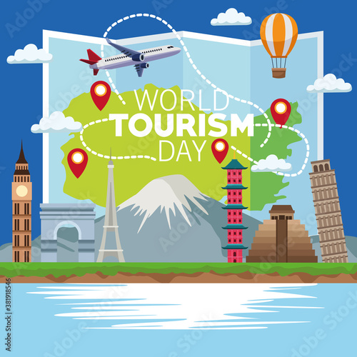 world tourism day lettering celebration with paper map and monuments
