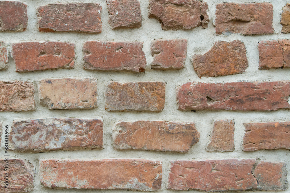 Fototapeta premium background old stone cracked red brown brick wall