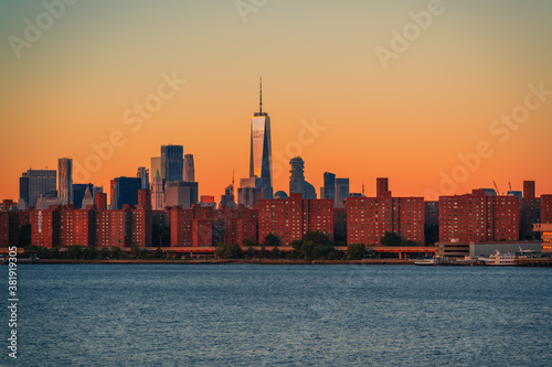 city skyline at sunset sunrise New York buildings beautiful sky colors orange 