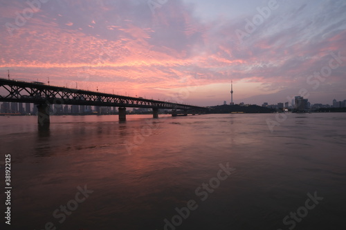 sunset of Wuhan Yangtze River Bridge. landmark of Wuhan,Hubei,China. Beautiful sunset clouds in sky