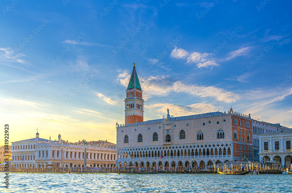 Venice cityscape with San Marco basin of Venetian lagoon water, Riva degli Schiavoni waterfront promenade, Doge's Palace Palazzo Ducale and Campanile bell tower building, Veneto Region, Italy