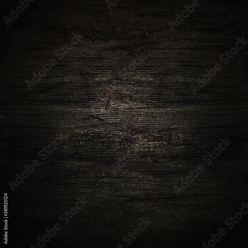 Dark background. Wooden black wall.