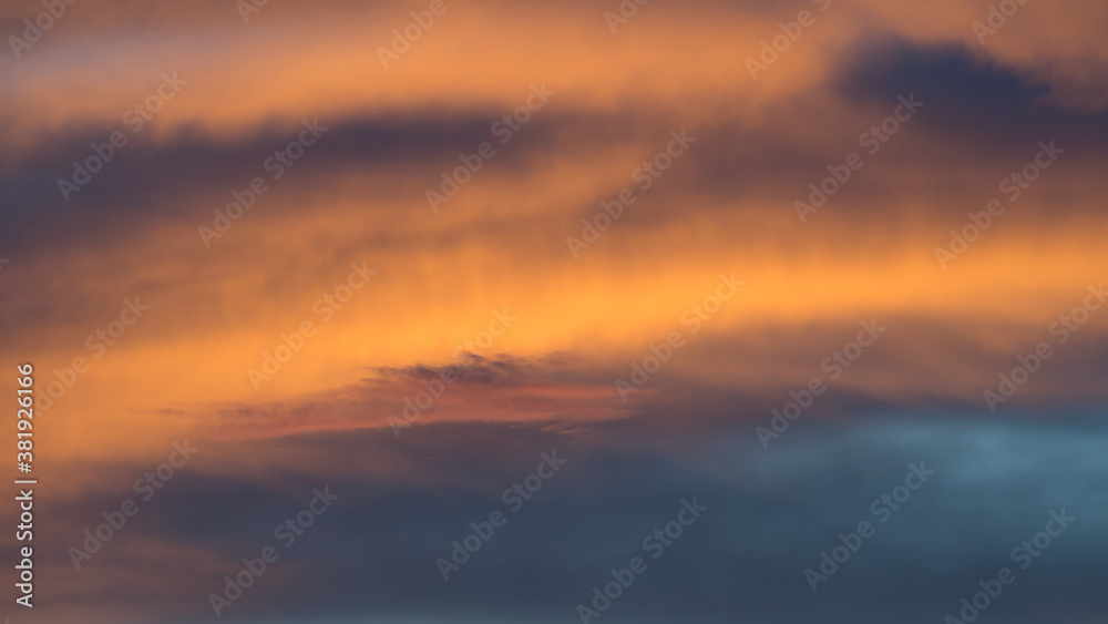 The evening sky and clouds change color.