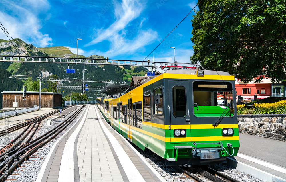 Obraz premium Rack mountain train in Wengen above the Lauterbrunnen Valleyin the Swiss Alps