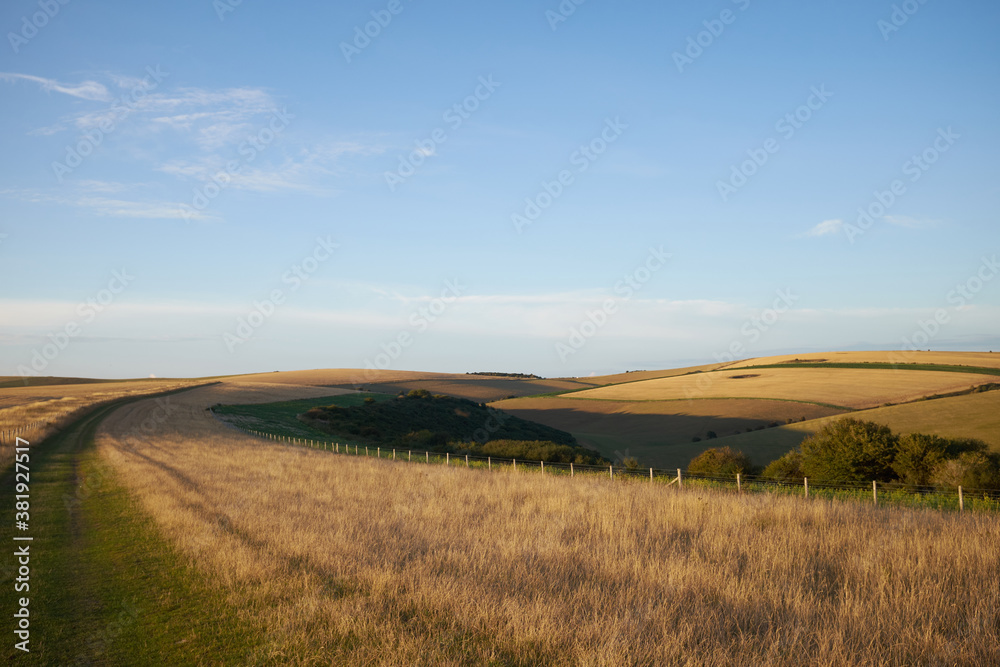 Public footpath through open countryside on South Downs way, East Sussex