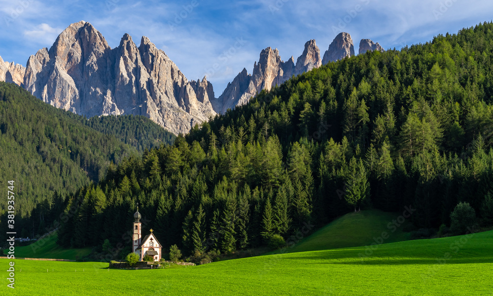 Church in Santa Maddalena village, Village in the Dolomites mountain peaks in St. Magdalena or Santa Maddalena with characteristic church, South Tyrol, Italy
