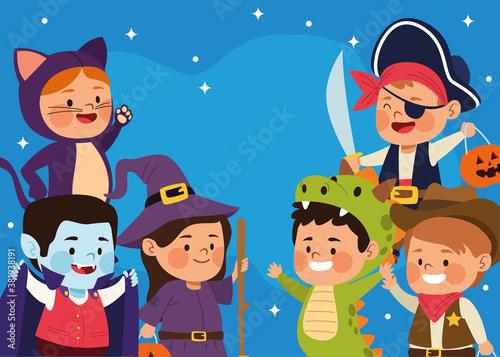 cute little kids dressed as a differents characters at night scene