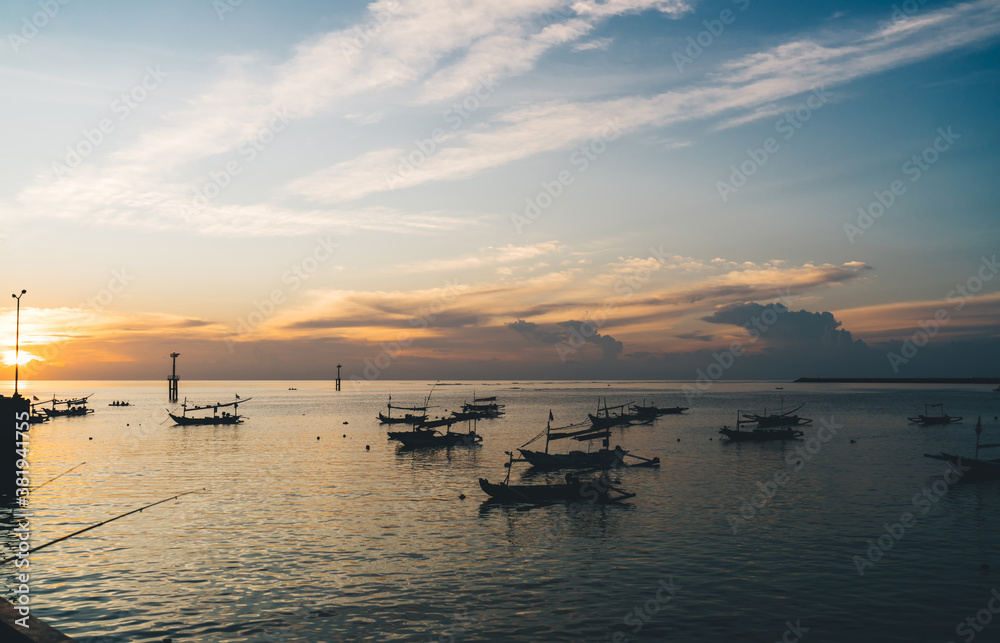 Breathtaking seascape of boats on sunset