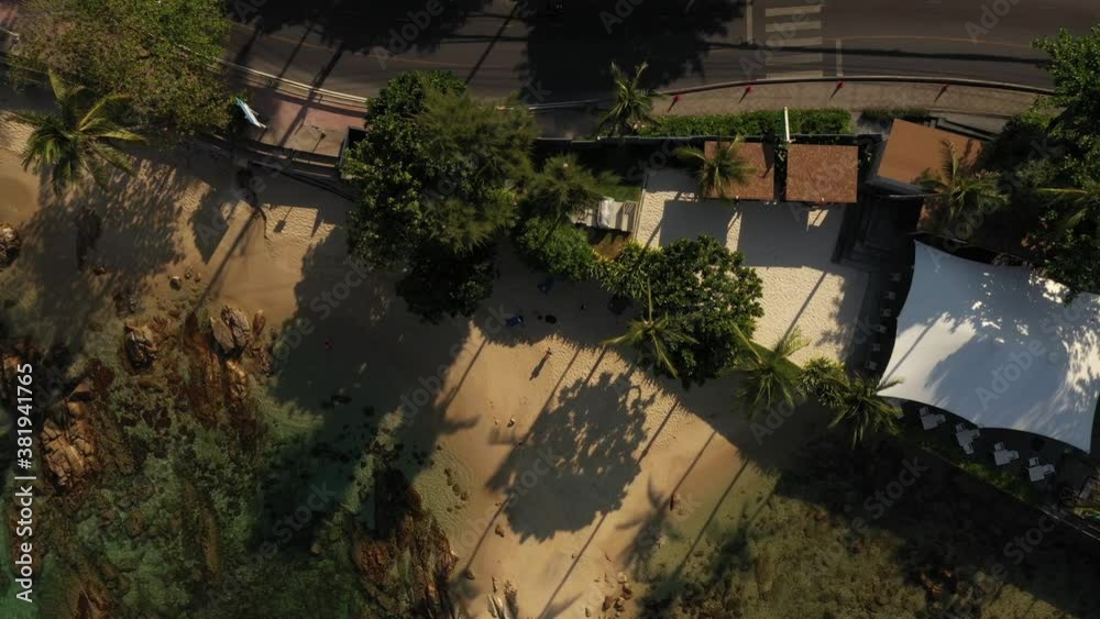 Top view of clear azure blue transparent sea with white sand. Hot sunny weather. Aerial view of the city. drone flight over the jungle and sea. overlooks the city Top view of clear azure blue transparent sea with white sand. Hot sunny weather. Aerial view of the city. drone flight over the jungle and sea. overlooks the city