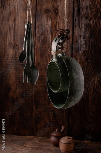 A set of kitchen appliances from eco materials. Recycled bowls and cutlery. photo