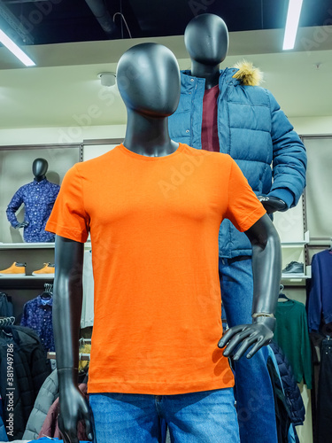 Black abstract mannequins in menswear department in store photo