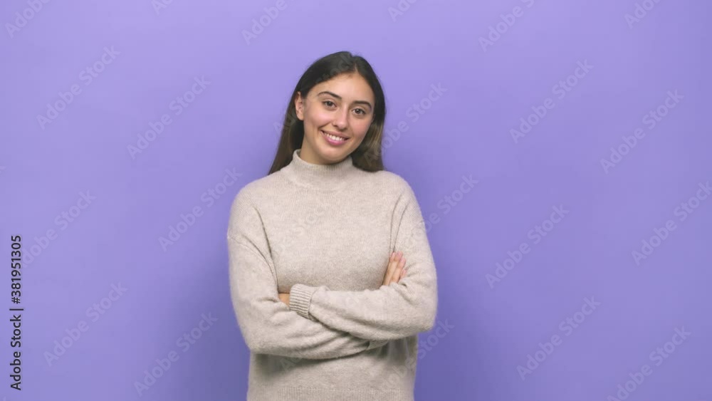Young caucasian woman who feels confident, crossing arms with determination Young caucasian woman who feels confident, crossing arms with determination