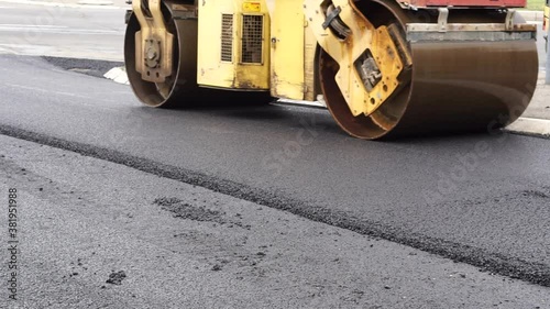 Road roller tarmac works surfacing street