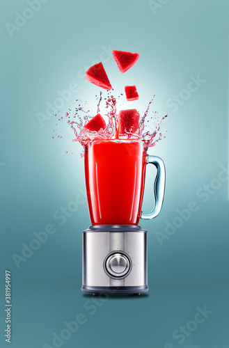 watermelon chunks falling into the blender, creating a nice splash